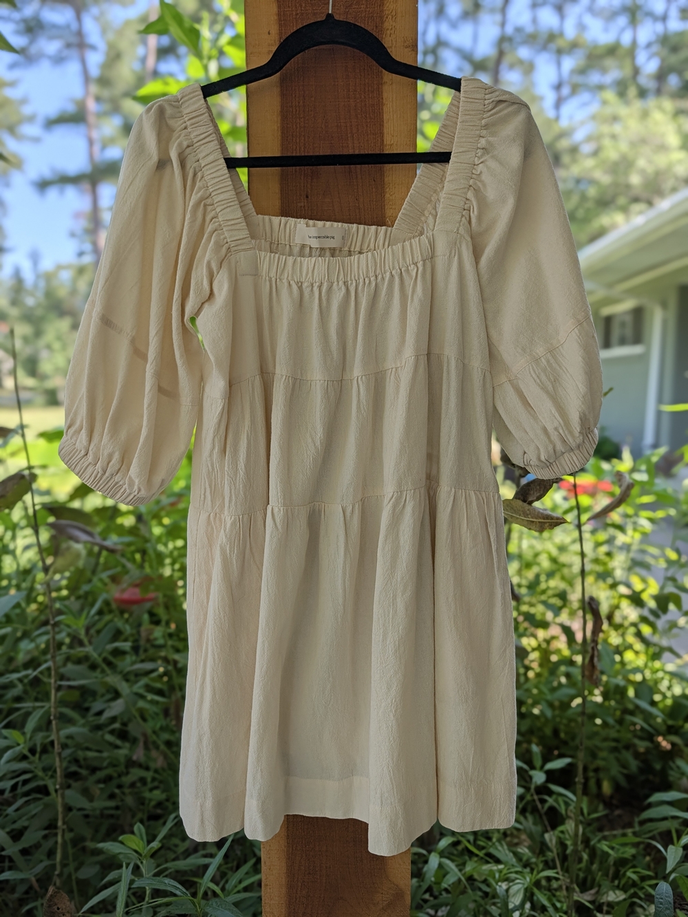 The Impeccable Pig Cream Square-Neck Tiered Babydoll Dress